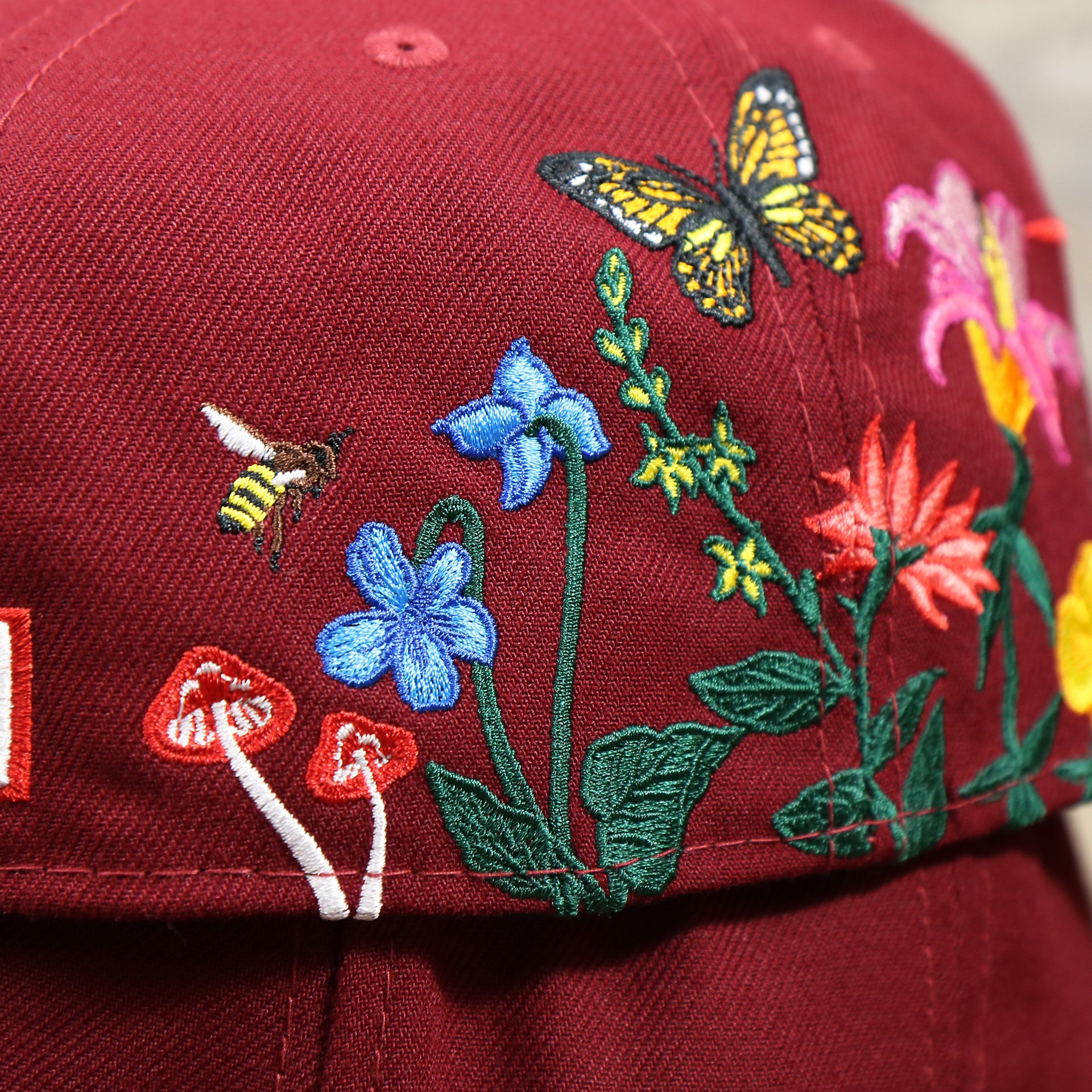 The Backside of the Bloom Patch on the Cooperstown Philadelphia Phillies Gray Bottom Bloom Spring Embroidery 59Fifty Fitted Cap | Maroon 59Fifty Cap
