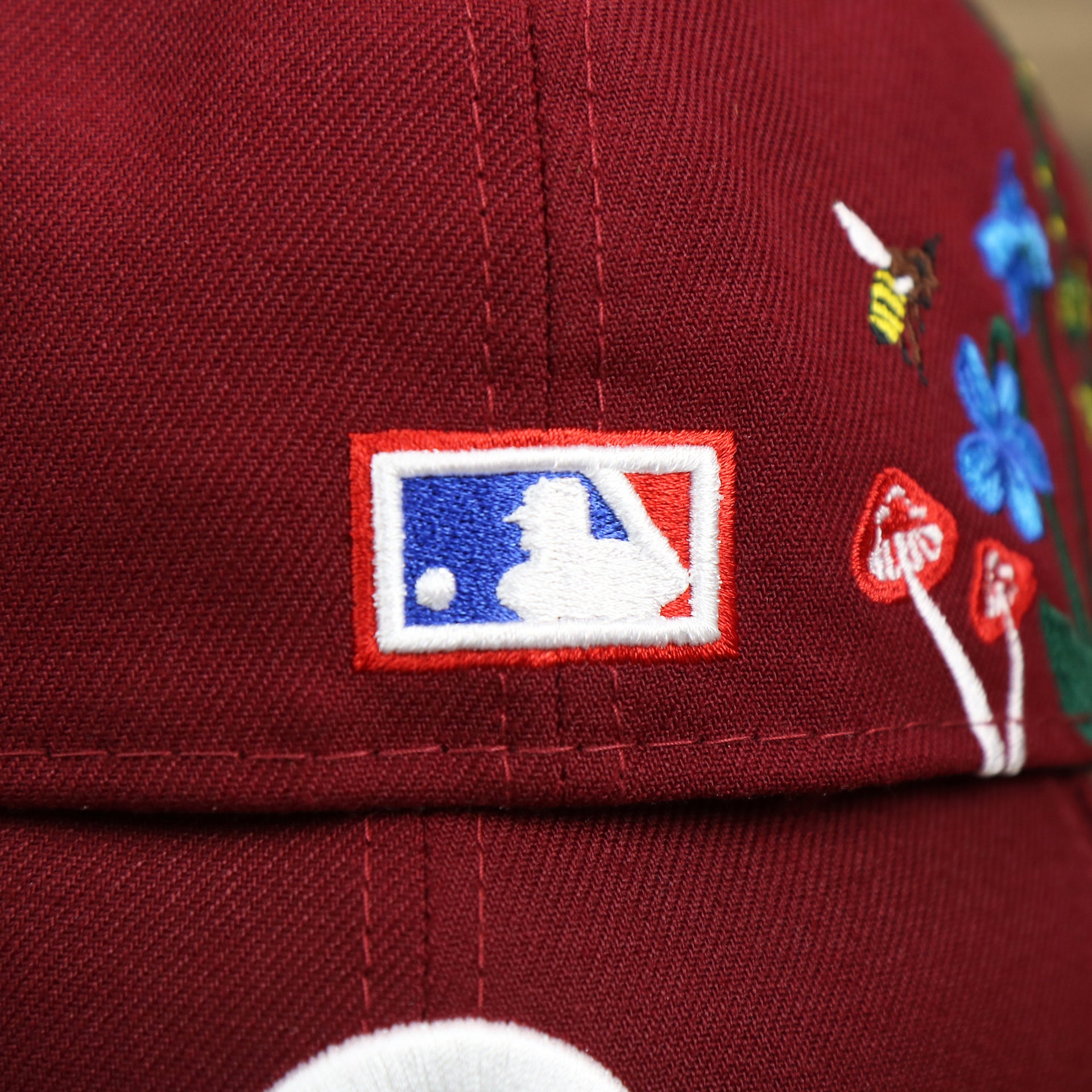 The MLB Batterman Logo on the Cooperstown Philadelphia Phillies Gray Bottom Bloom Spring Embroidery 59Fifty Fitted Cap | Maroon 59Fifty Cap