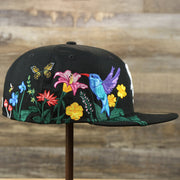 The wearer's right on the Chicago White Sox Gray Bottom Bloom Spring Embroidery 59Fifty Fitted Cap | Black 59Fifty Cap