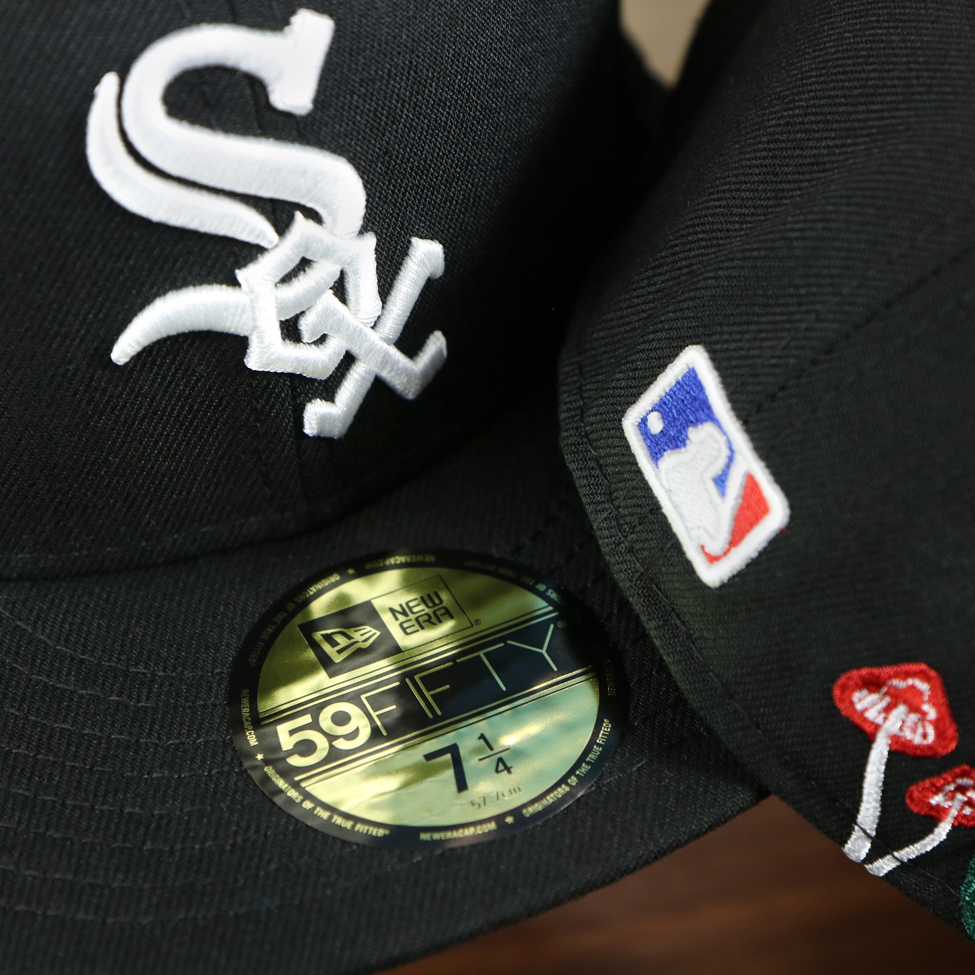 The 59Fifty Sticker on the Chicago White Sox Gray Bottom Bloom Spring Embroidery 59Fifty Fitted Cap | Black 59Fifty Cap
