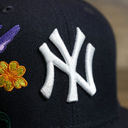 The Yankees Logo on the New York Yankees Gray Bottom Bloom Spring Embroidery 59Fifty Fitted Cap | Navy Blue 59Fifty Cap