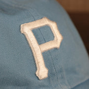 Pittsburgh Pirates Pink Bottom Icy Blue Clean Up Dad Hat  Up close front-right view of Pittsburgh Pirates logo of the cap