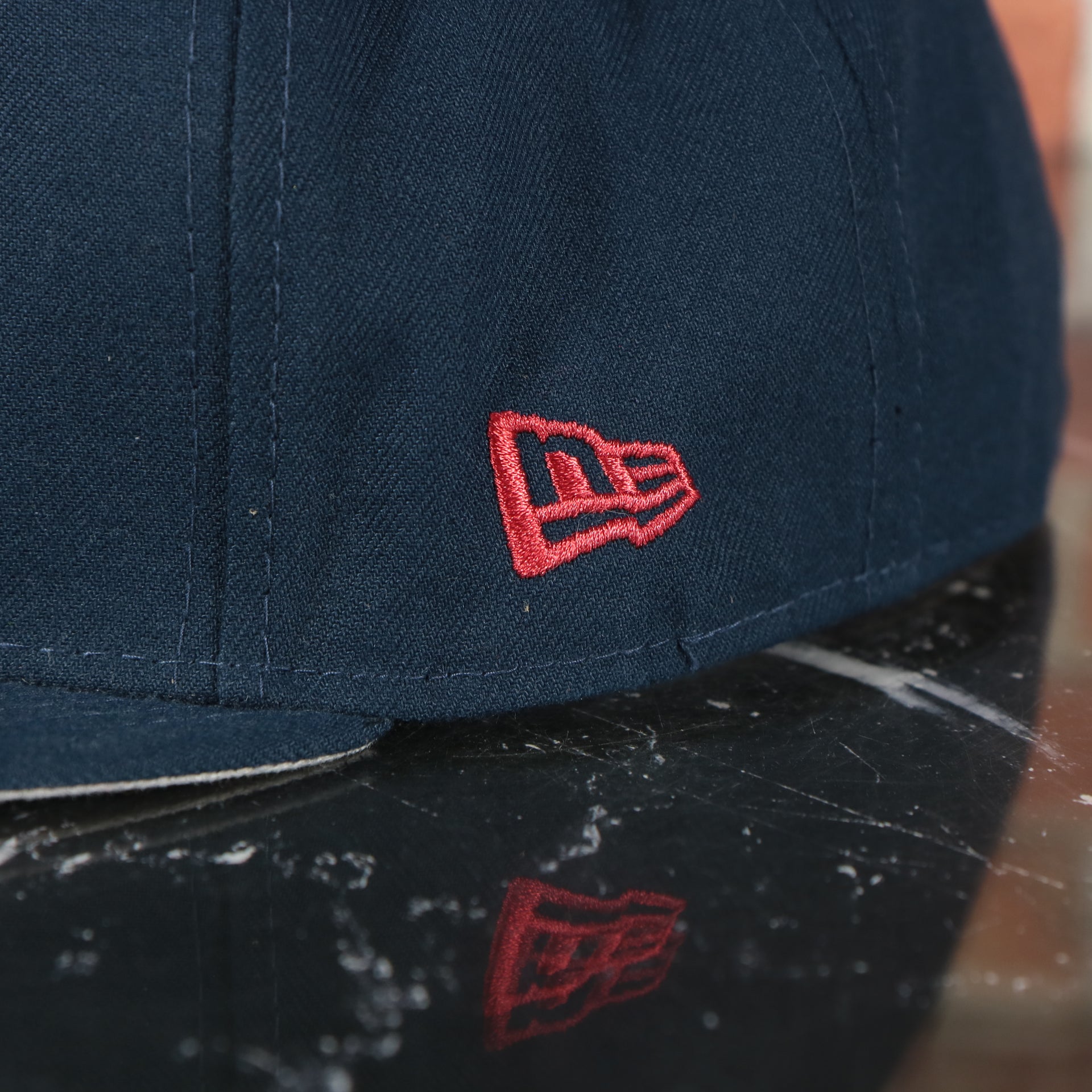 new era logo on the New England Patriots Tribute Turn Grey Bottom | Navy 59Fifty Fitted Cap