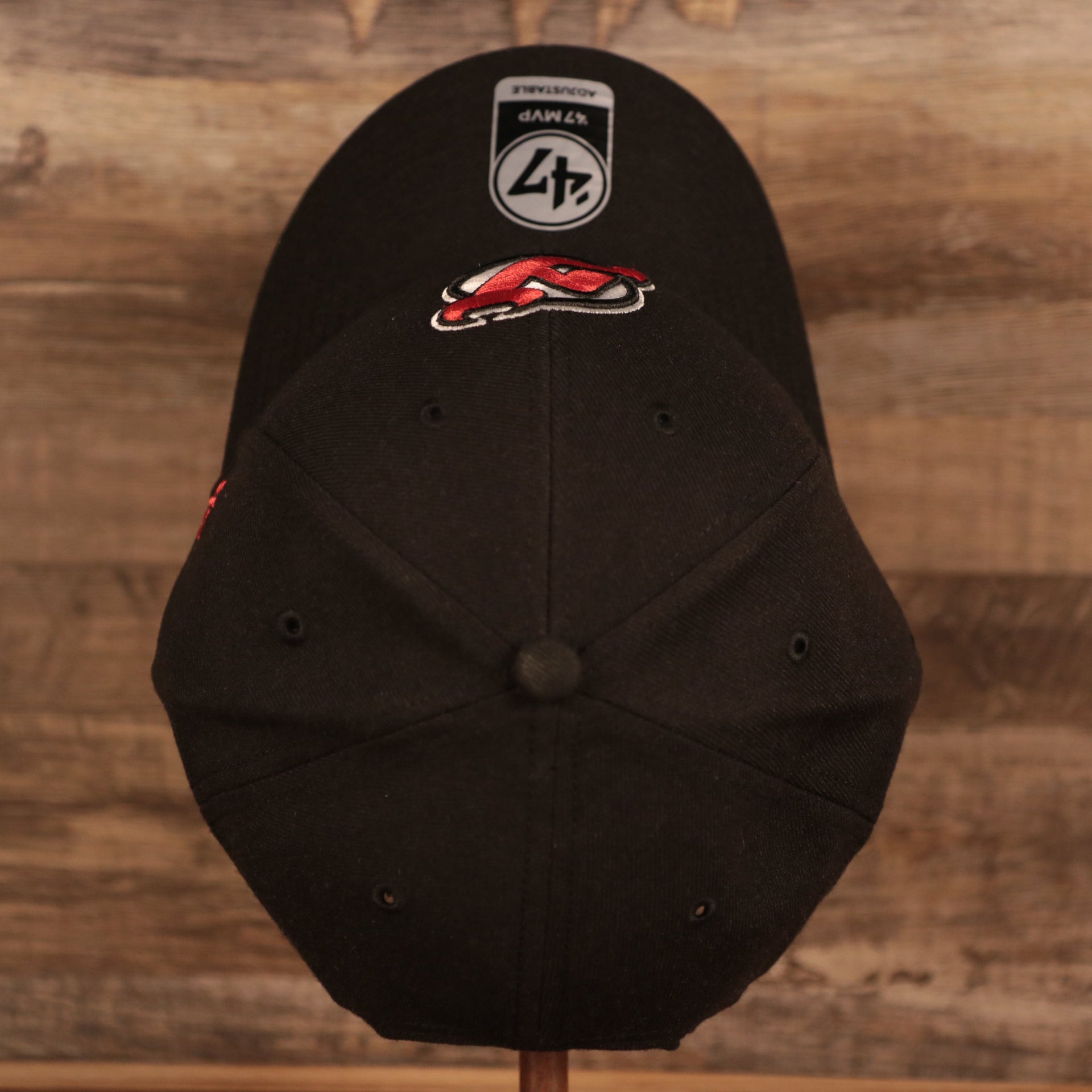 top of the New Jersey Devils Black Adjustable Dad Hat