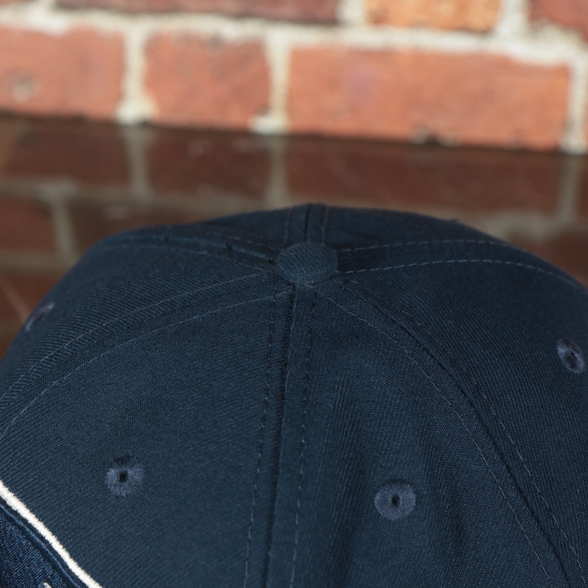 navy button on the New England Patriots Tribute Turn Grey Bottom | Navy 59Fifty Fitted Cap