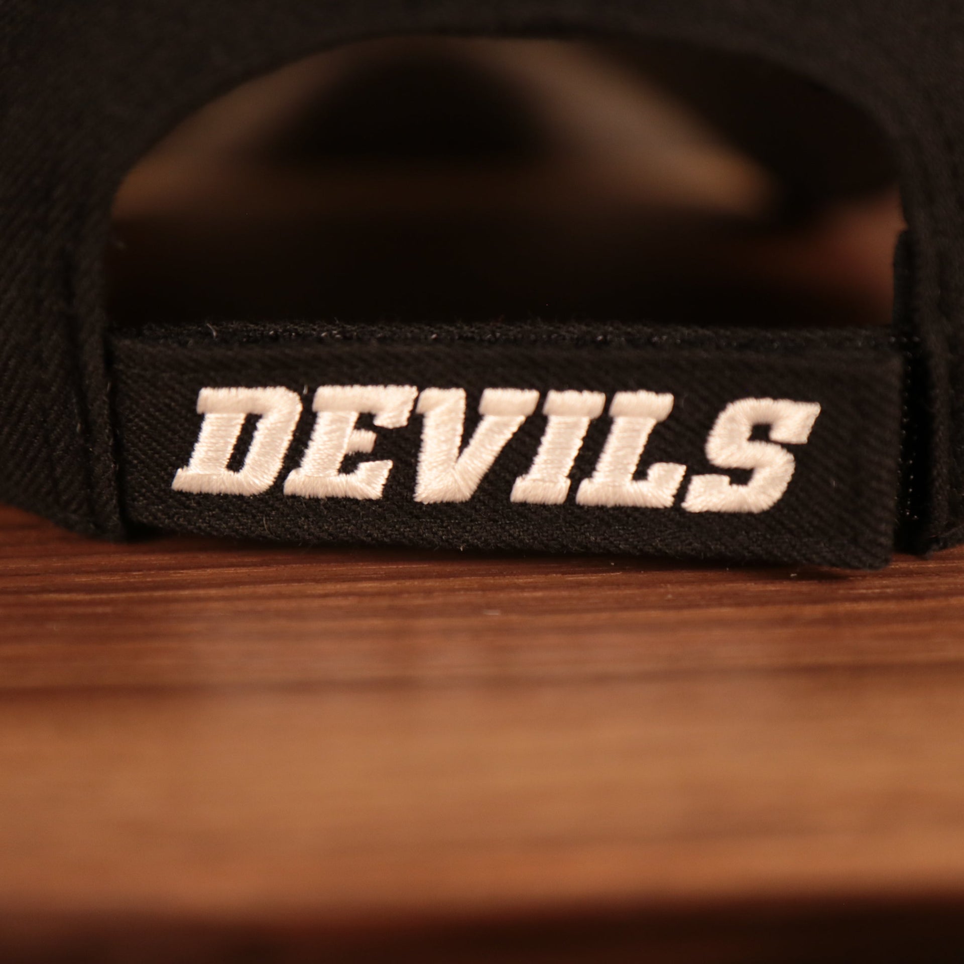 devils logo on the Velcro strap New Jersey Devils Black Adjustable Dad Hat