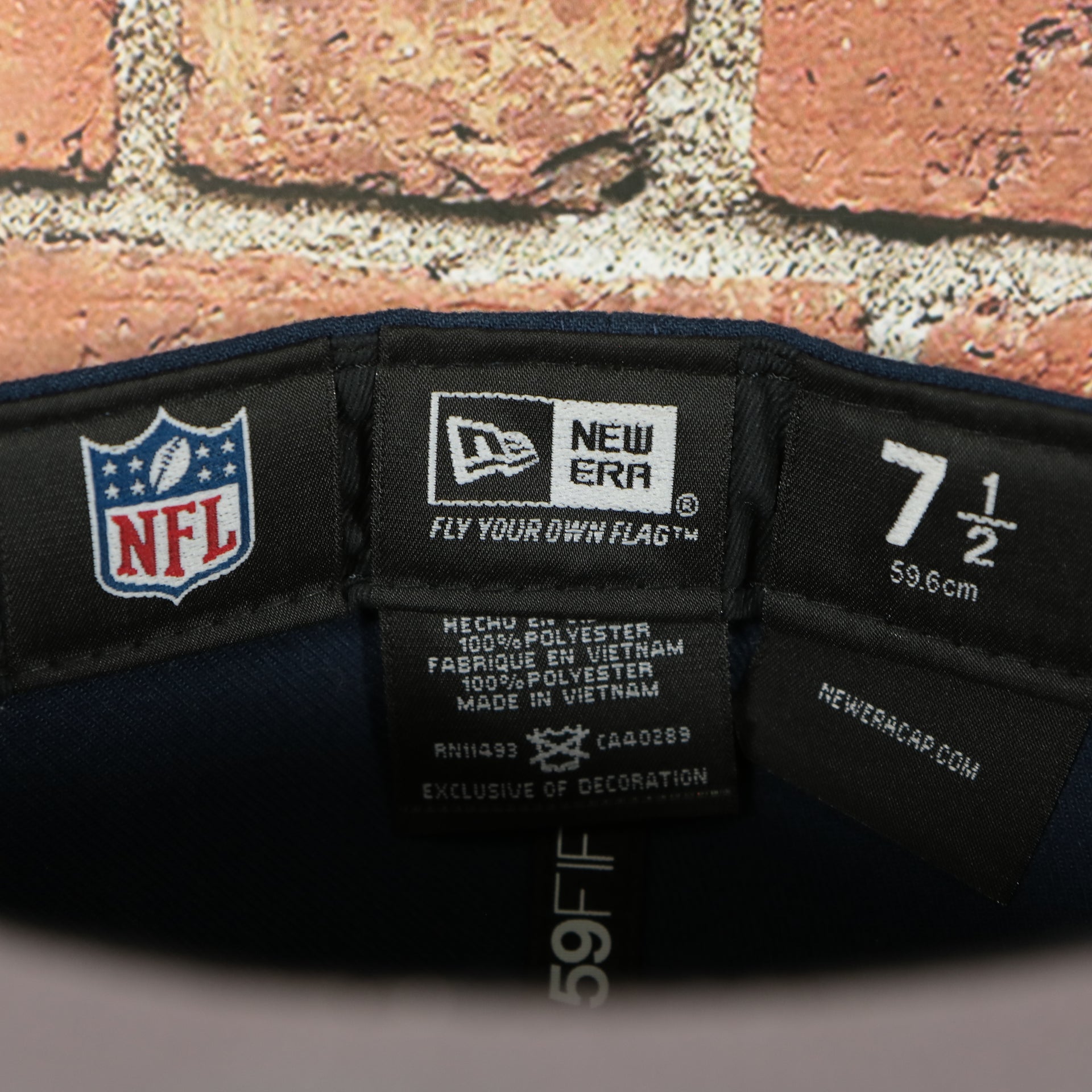new era label on the New England Patriots Tribute Turn Grey Bottom | Navy 59Fifty Fitted Cap