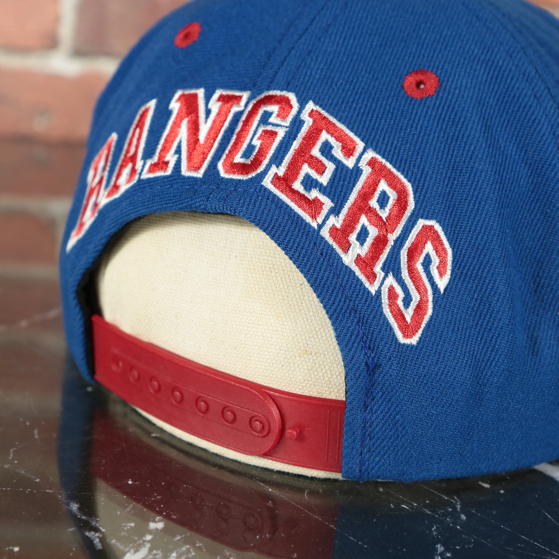 rangers wordmark on the Cooperstown Texas Rangers Blockhead Green Bottom | Two tone Blue on Red Snapback Hat