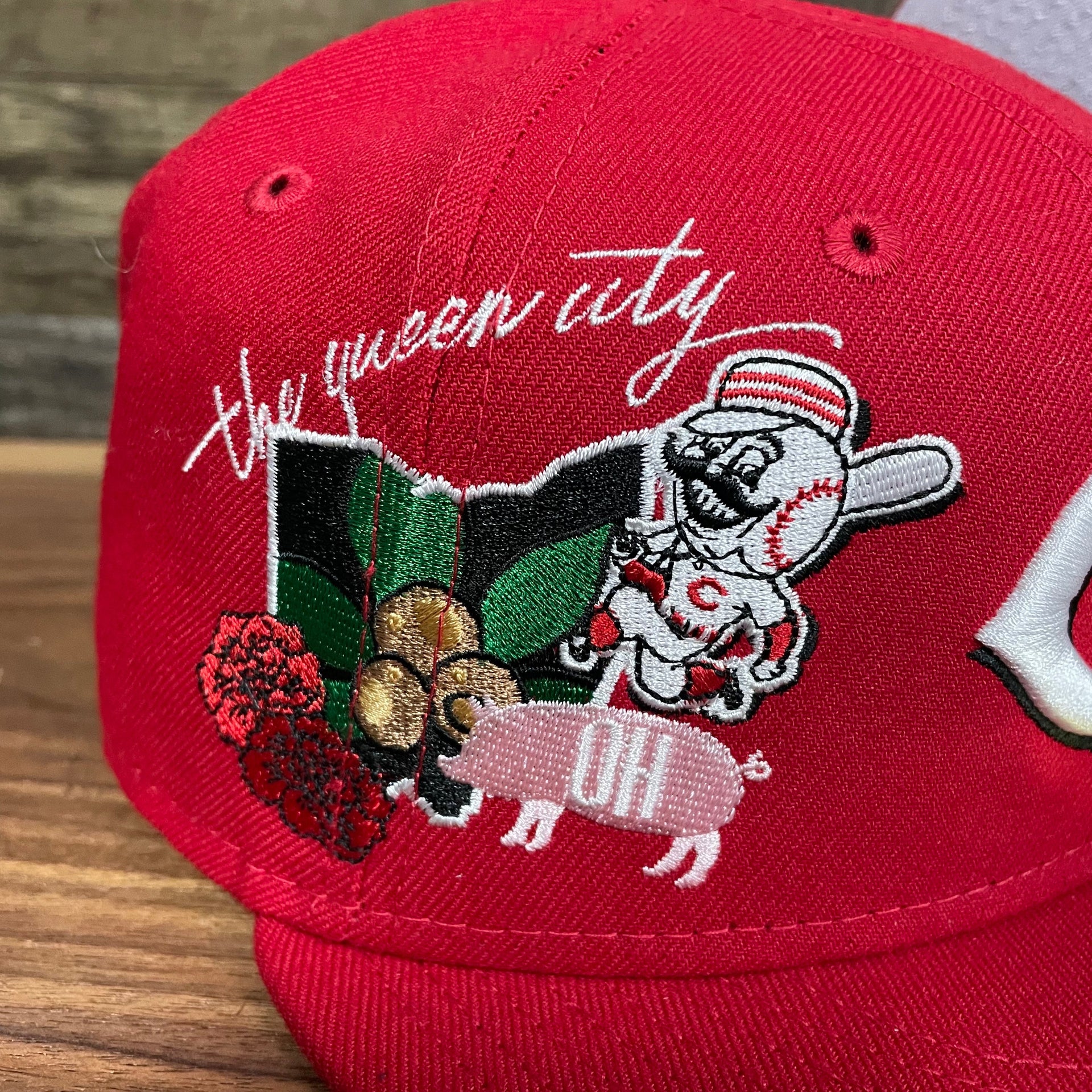 Close up of the patch on the Cincinnati Reds "City Cluster" Side Patch Gray Bottom Red 59Fifty Fitted Cap
