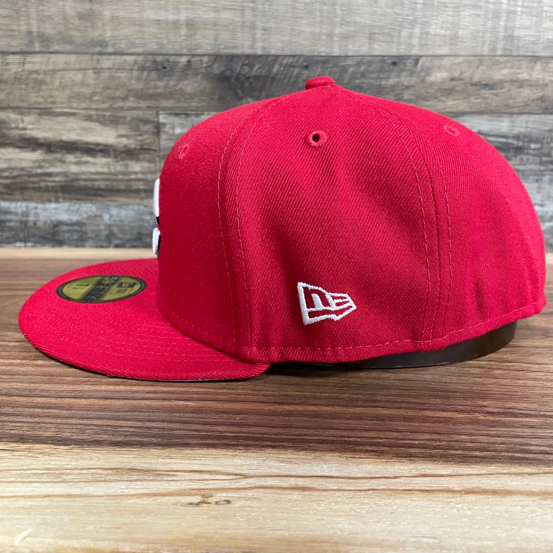 Wearer's left of the Cincinnati Reds "City Cluster" Side Patch Gray Bottom Red 59Fifty Fitted Cap