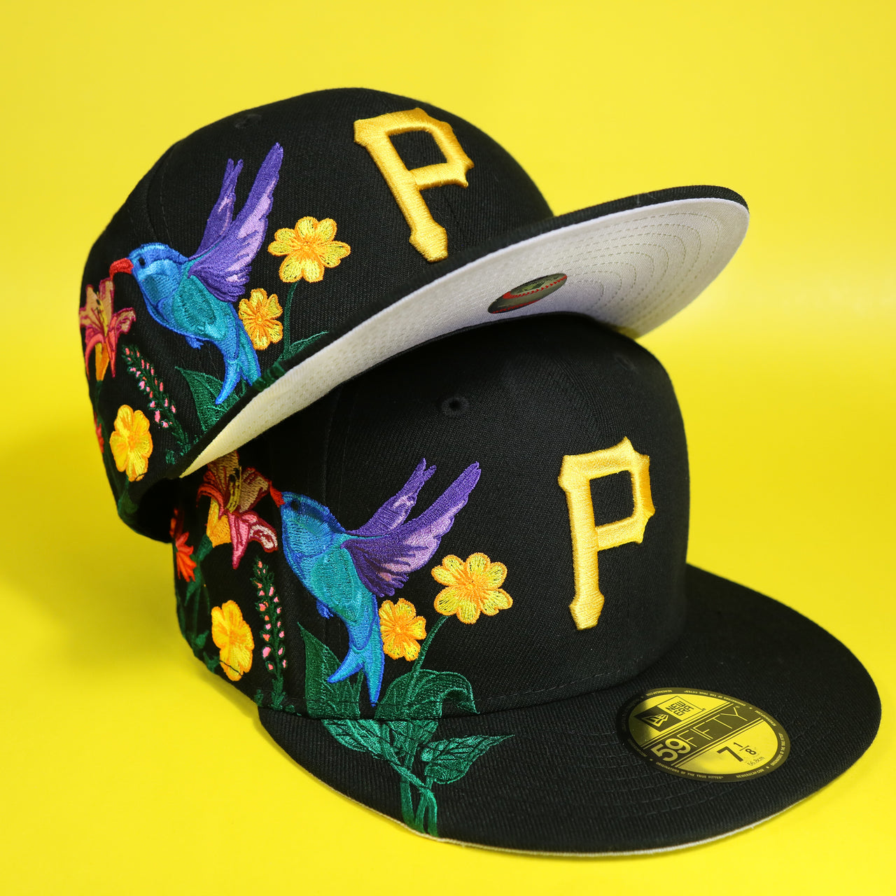 The Pittsburgh Pirates Gray Bottom Bloom Spring Embroidery 59Fifty Fitted Cap | Black 59Fifty Cap with another cap