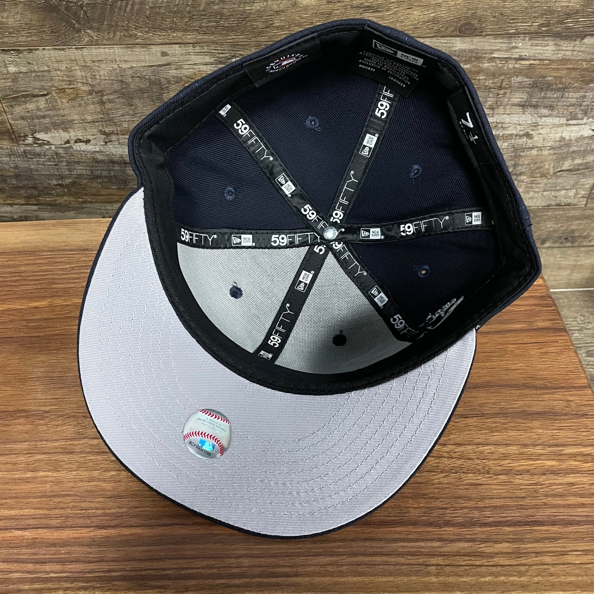 Gray under visor and interior of the New York Yankees "City Cluster" Side Patch Gray Bottom Navy 59Fifty Fitted Cap