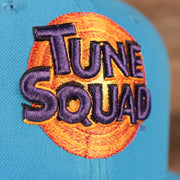 Tune Squad logo on the Tune Squad Shield Lebron 18 Space Jam Matching 59Fifty Fitted Cap | Blue