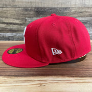 Wearer's left of the Philadelphia Phillies "City Cluster" Side Patch Gray Bottom Red 59Fifty Fitted Cap