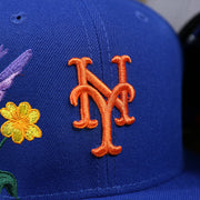 The Mets Logo on the New York Mets Gray Bottom Bloom Spring Embroidery 59Fifty Fitted Cap | Royal Blue 59Fifty Cap