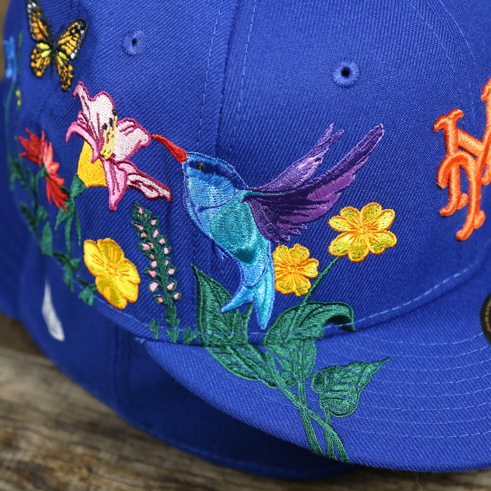 The Bloom Embroidery on the New York Mets Gray Bottom Bloom Spring Embroidery 59Fifty Fitted Cap | Royal Blue 59Fifty Cap