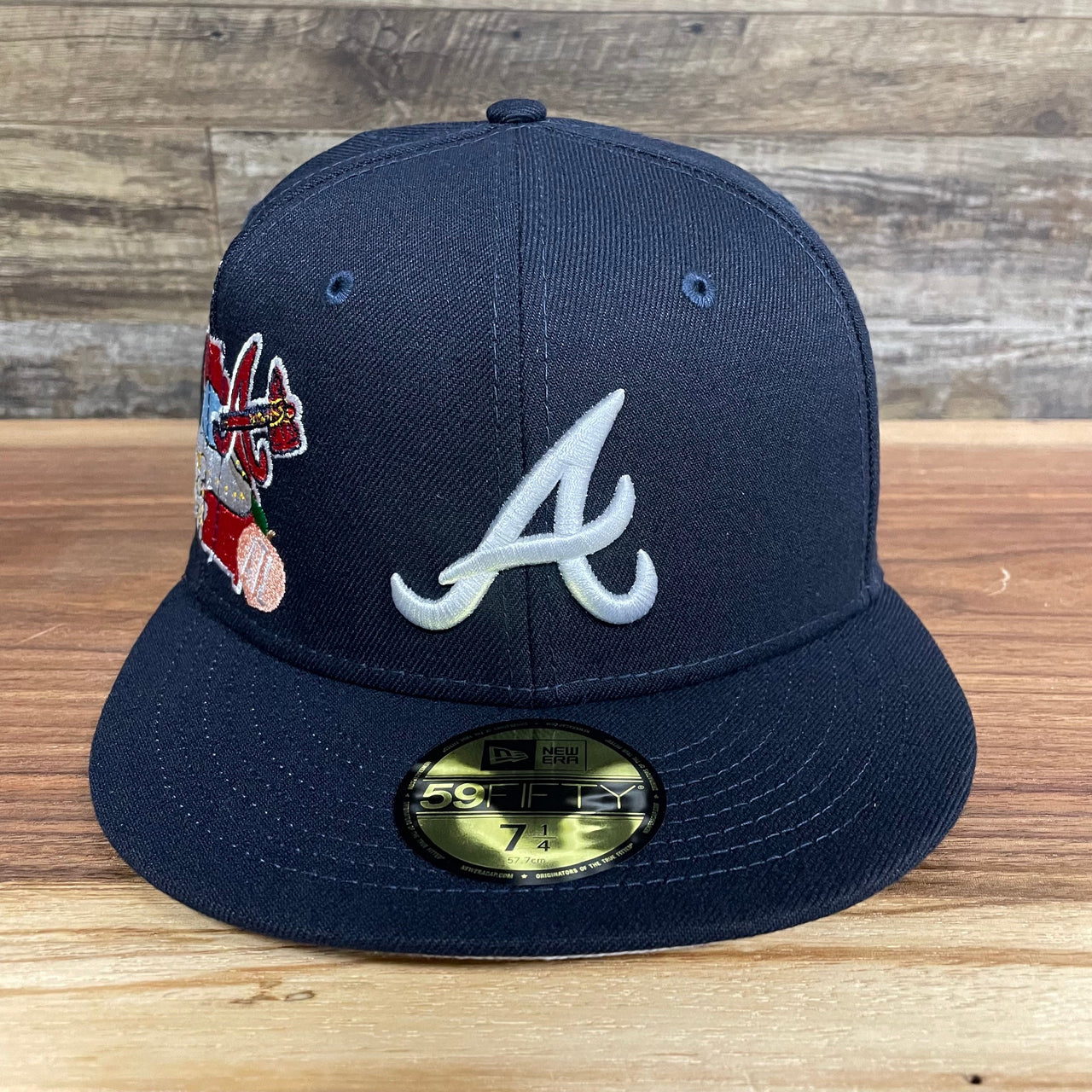 Front of the Atlanta Braves "City Cluster" Side Patch Gray Bottom Navy 59Fifty Fitted Cap