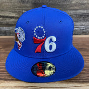 Front of the Philadelphia 76ers "City Cluster" Side Patch Gray Bottom Royal 59Fifty Fitted Cap