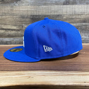 Wearer's left of the Philadelphia 76ers "City Cluster" Side Patch Gray Bottom Royal 59Fifty Fitted Cap