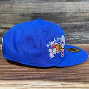Wearer's right of the Philadelphia 76ers "City Cluster" Side Patch Gray Bottom Royal 59Fifty Fitted Cap