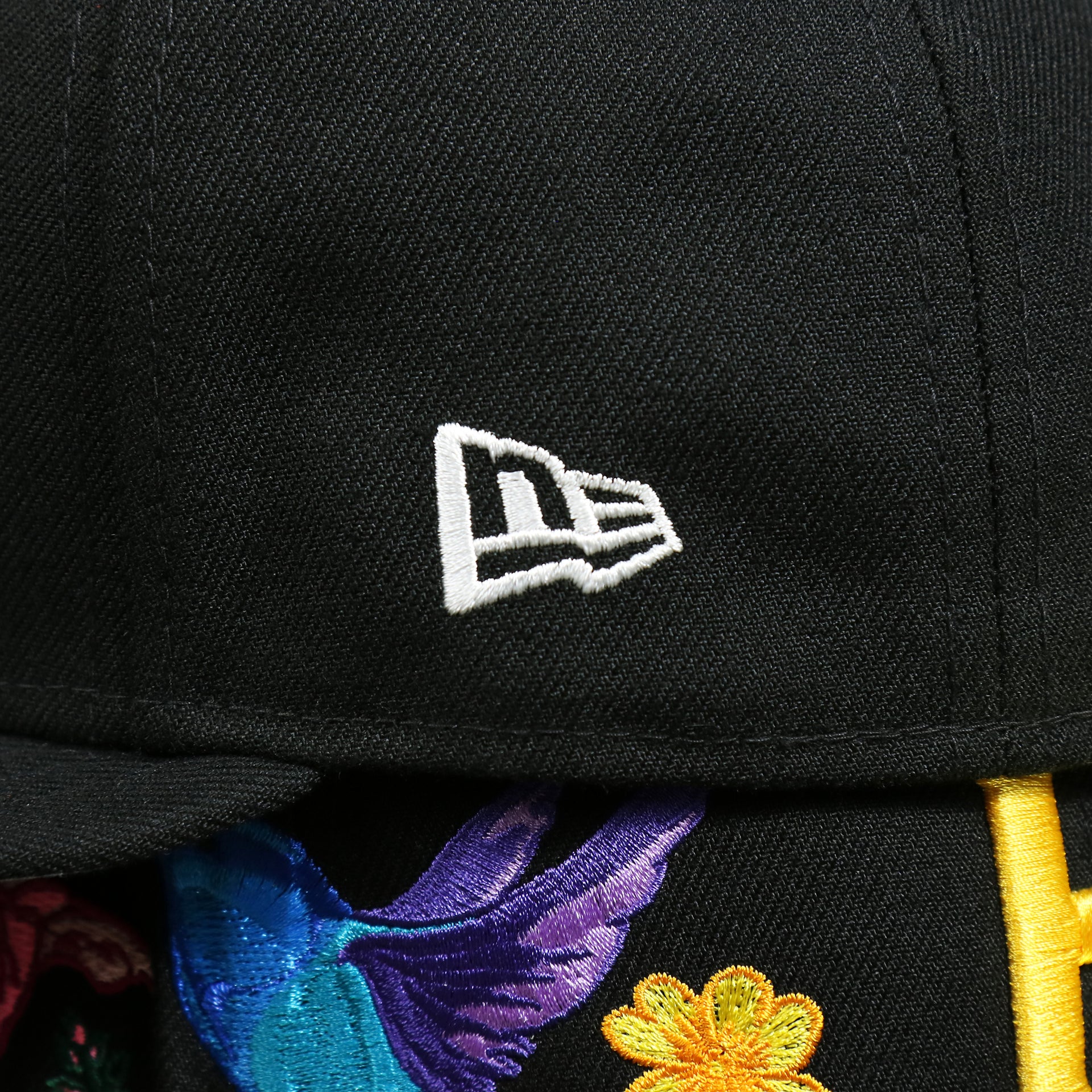 The New Era Logo on the Pittsburgh Pirates Gray Bottom Bloom Spring Embroidery 59Fifty Fitted Cap | Black 59Fifty Cap