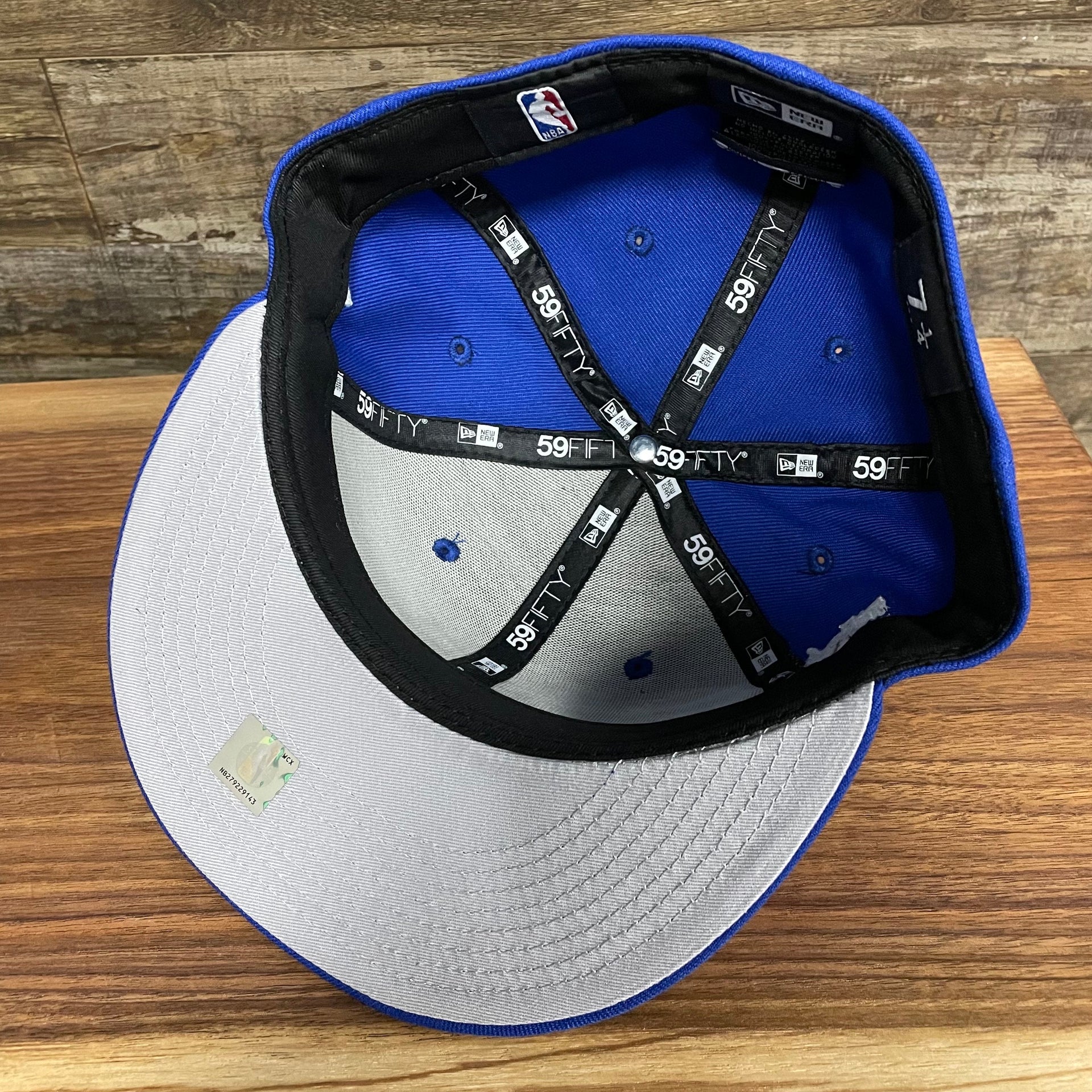 Under visor of the Philadelphia 76ers "City Cluster" Side Patch Gray Bottom Royal 59Fifty Fitted Cap