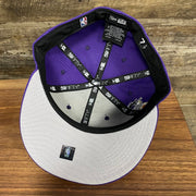 Gray under visor and interior of the Los Angeles Lakers "City Cluster" Side Patch Gray Bottom Purple 59Fifty Fitted Cap