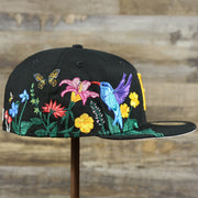 The wearer's right on the Pittsburgh Pirates Gray Bottom Bloom Spring Embroidery 59Fifty Fitted Cap | Black 59Fifty Cap