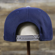 The backside of the Georgetown Hoyas Team Script Gray Bottom 9Fifty Snapback | Navy Blue And Gray Snap Cap'