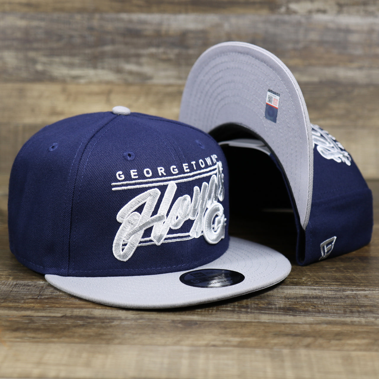 The Georgetown Hoyas Team Script Gray Bottom 9Fifty Snapback | Navy Blue And Gray Snap Cap