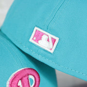 Close up of the MLB Batterman logo on the Philadelphia Phillies 1996 All Star Game Magenta Bottom 59FIFTY Fitted Cap | Vice Blue Pack
