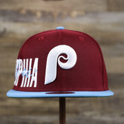 The front of the Cooperstown Philadelphia Phillies MLB Side Font Green Bottom 9Fifty Snapback Cap | Maroon Snap Cap