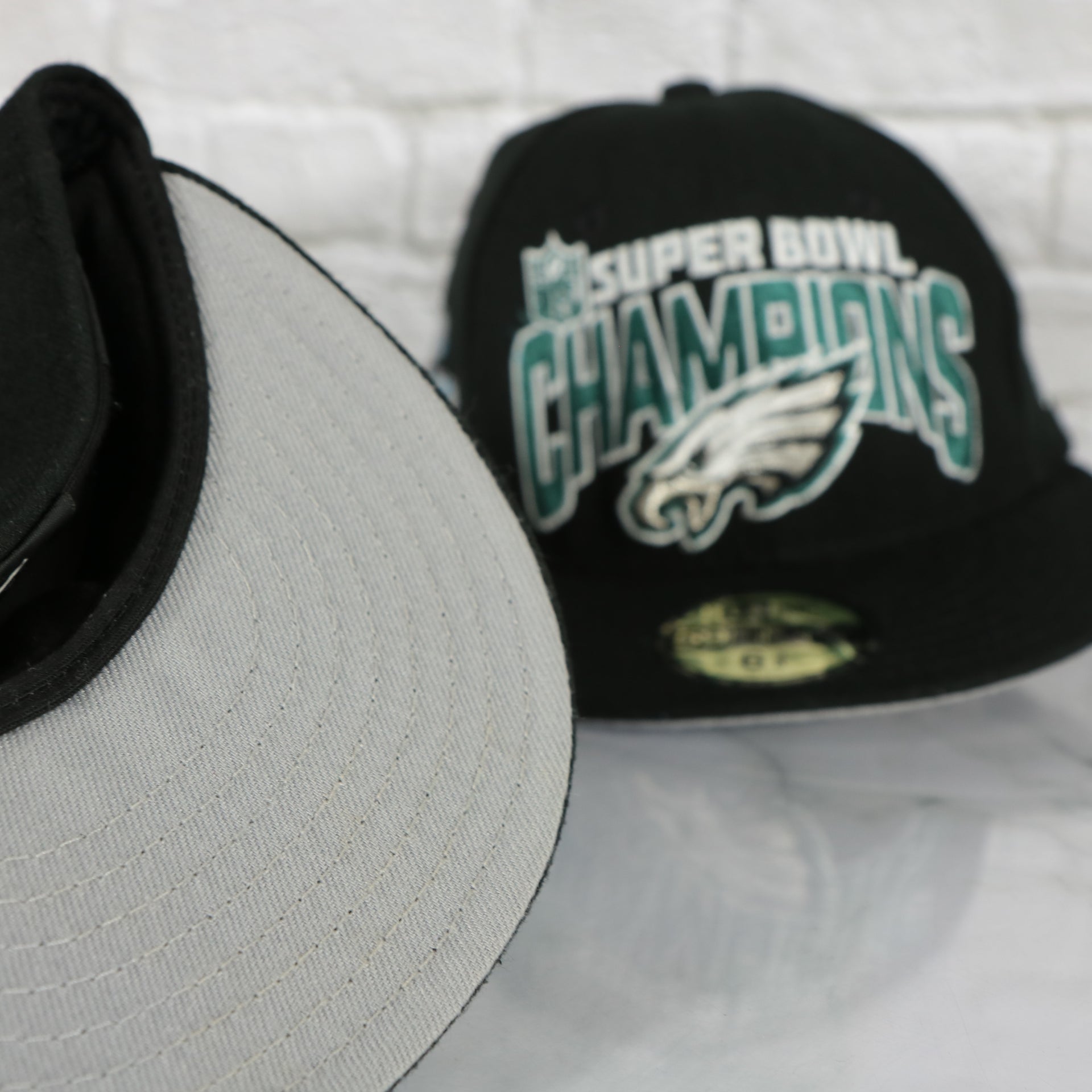 grey under visor on the NEW ERA | PHILADELPHIA EAGLES | 2018 SUPER BOWL LII CHAMPIONS | 59FIFTY FITTED CAP | BLACK