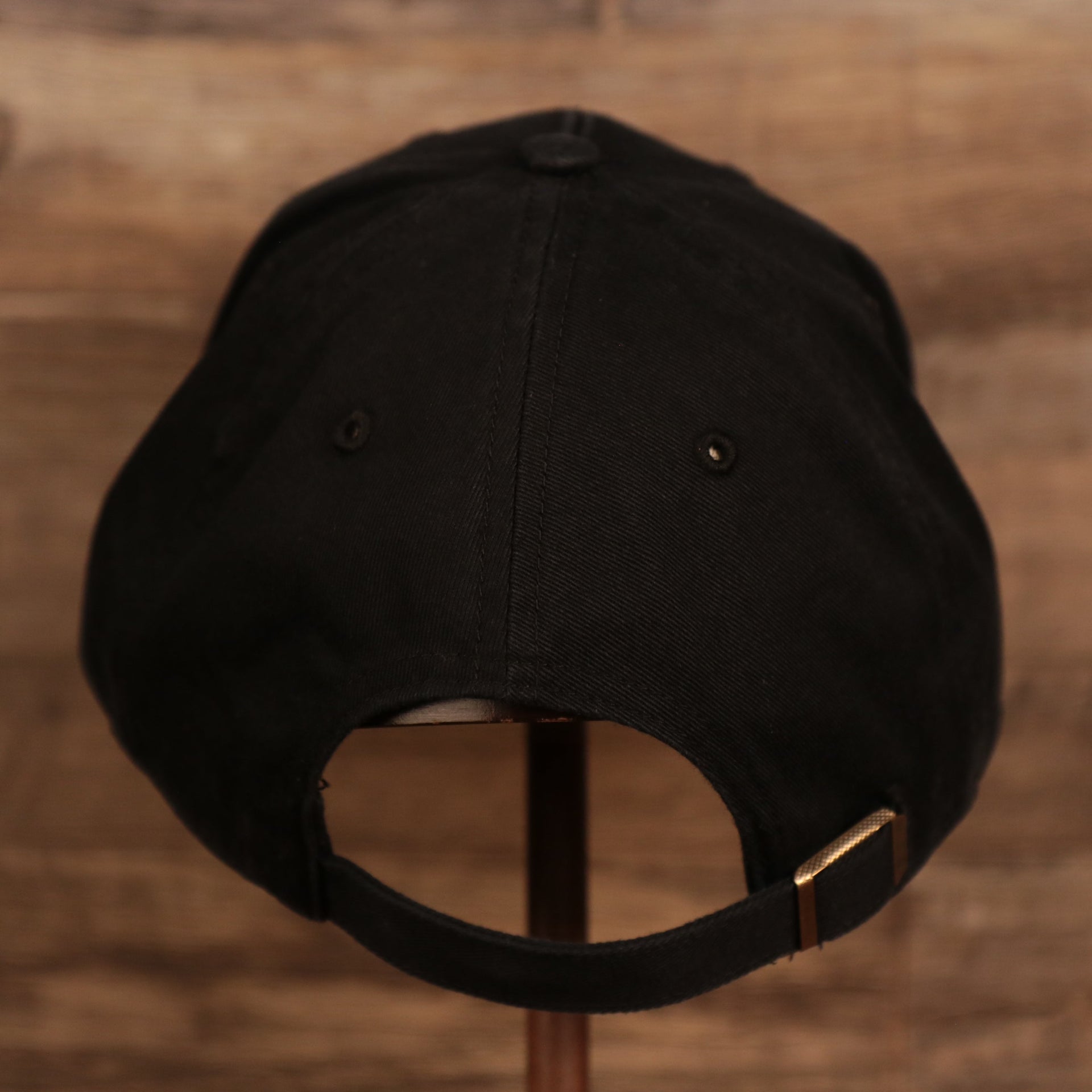 back side of the Miami Marlins Black Adjustable Dad Hat