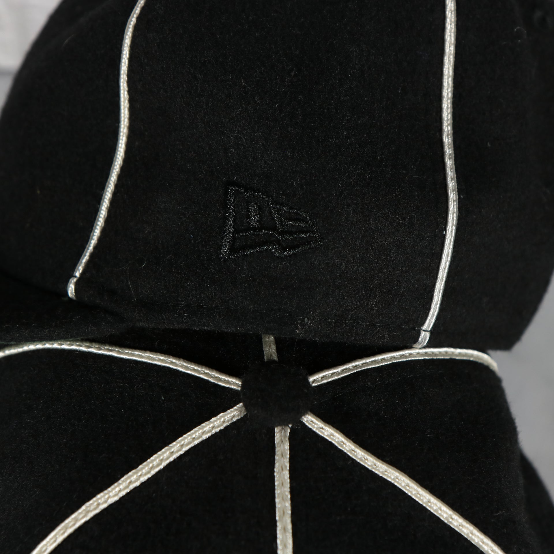 new era logo on the Philadelphia Phillies Vintage 1903 Heritage Series Retro Crown Black 9Fifty Snapback Hat