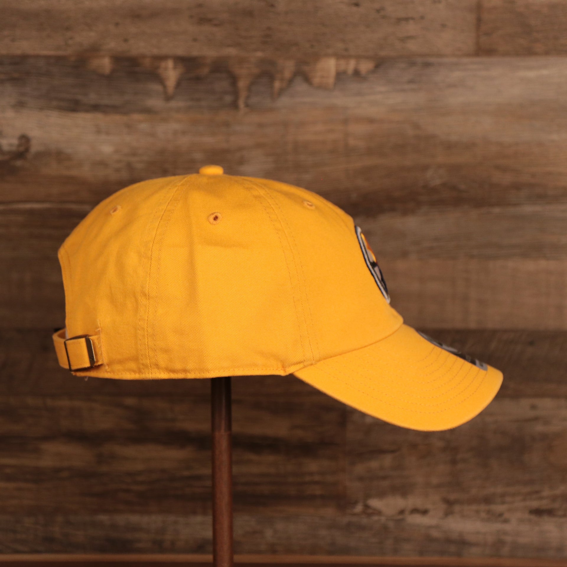 wearers right side of the Pittsburgh Steelers Yellow Adjustable Dad Hat