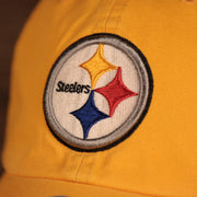 steelers logo on the Pittsburgh Steelers Yellow Adjustable Dad Hat