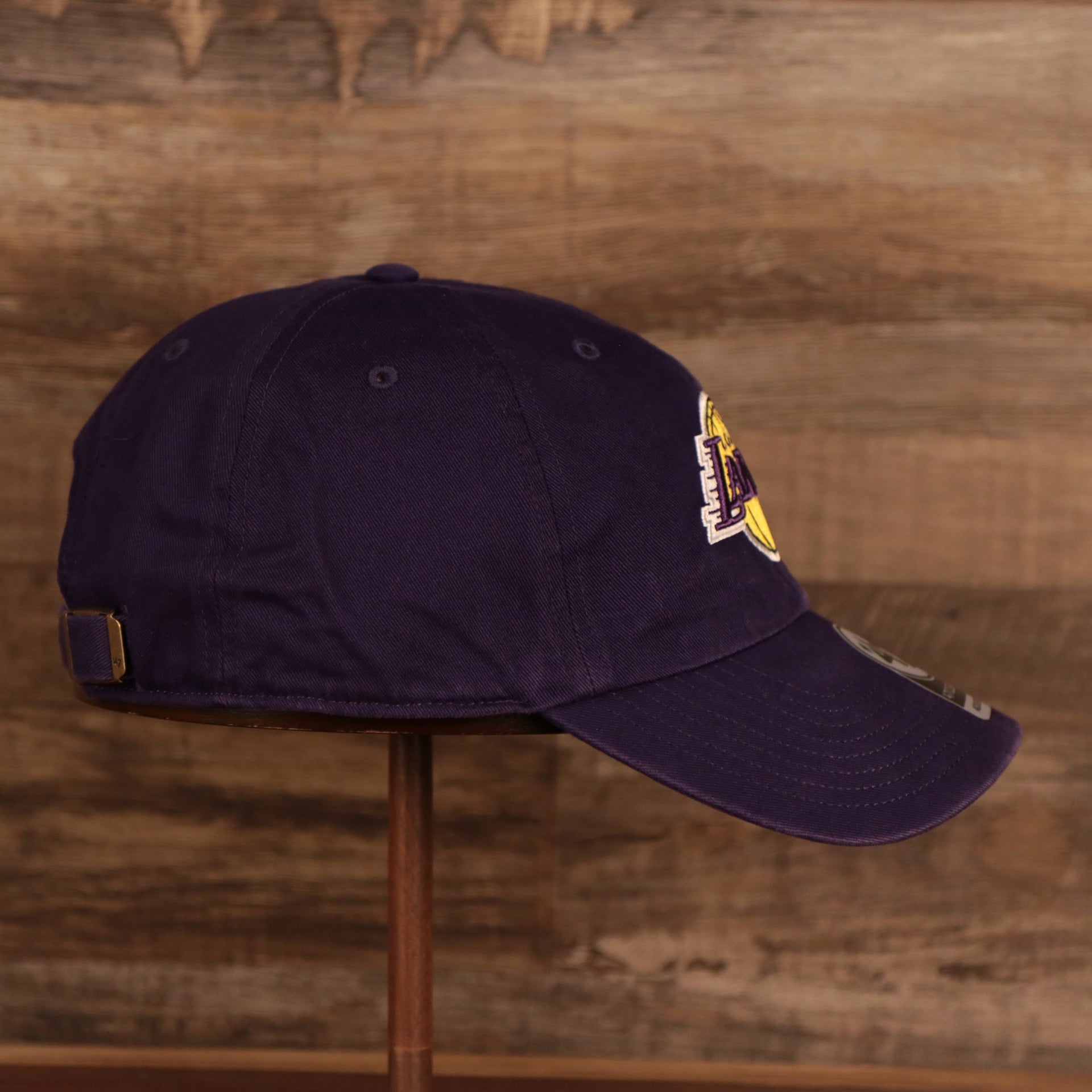 wearers right side of the Los Angeles Lakers Purple Adjustable Dad Hat