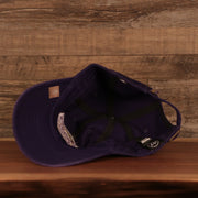 bottom of the Los Angeles Lakers Purple Adjustable Dad Hat