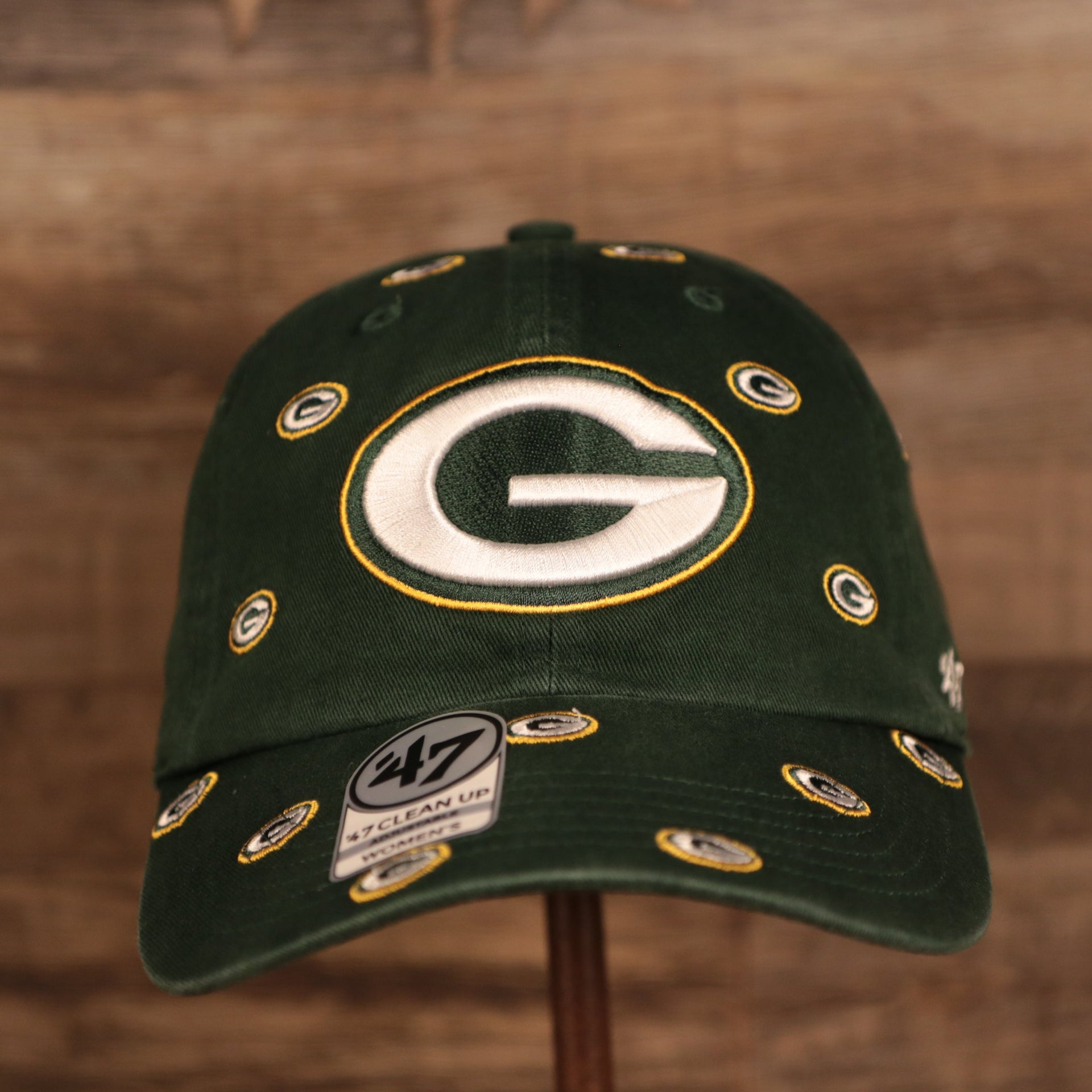front of the Green Bay Packers All Over Logo Patch Green Adjustable Dad Hat