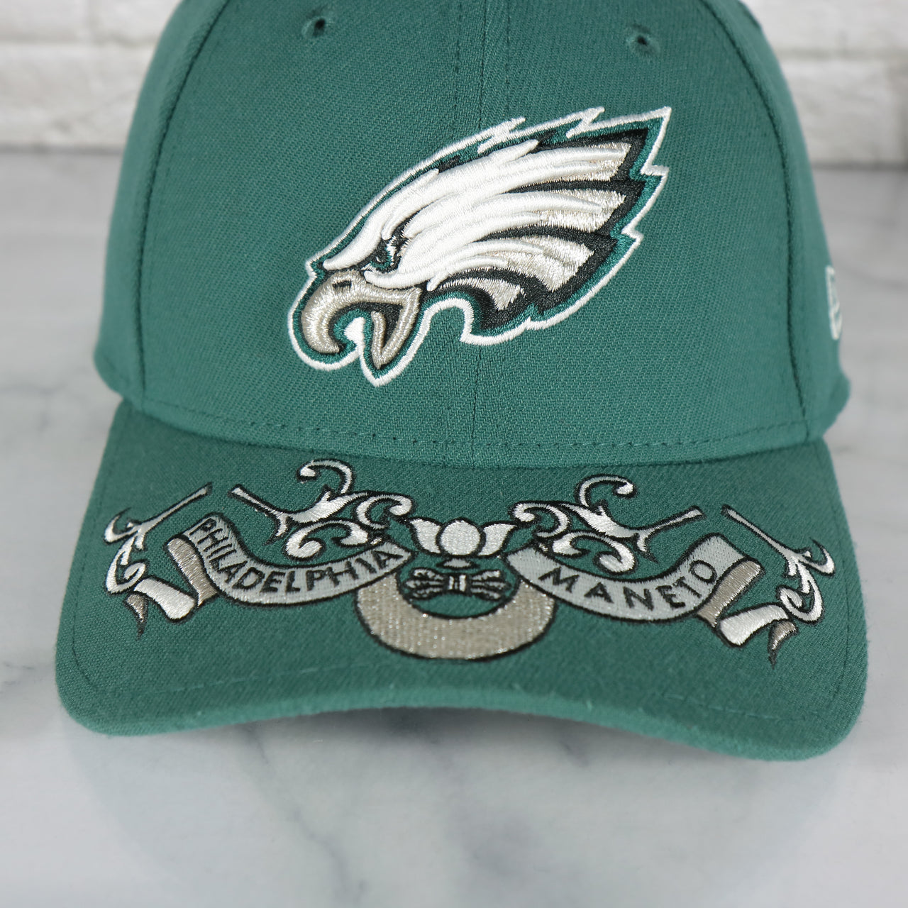 philadelphia city seal on the Philadelphia Eagles 2019 NFL Draft Team Color Midnight Green 39Thirty Flexfit Cap