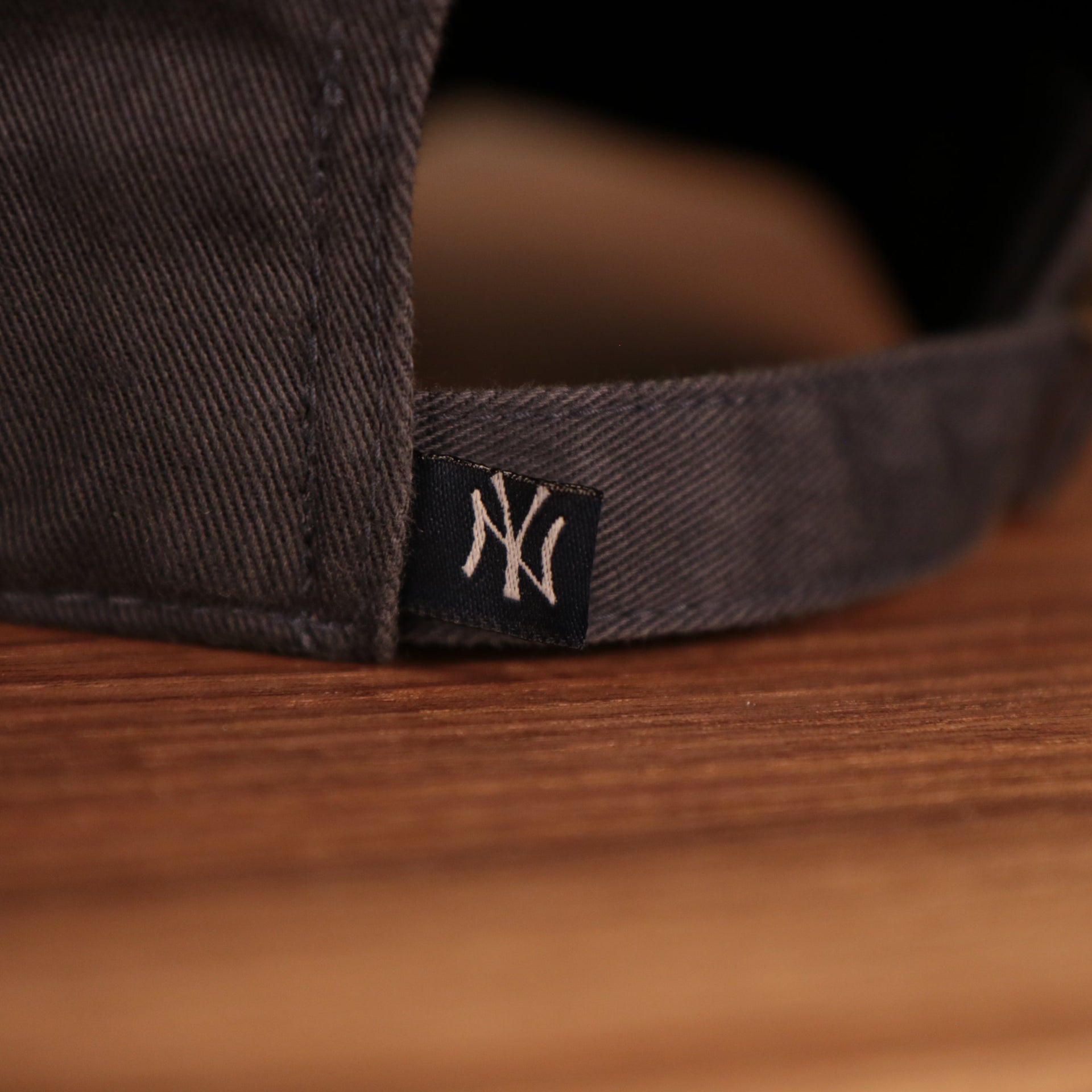 yankees logo tag on the adjustable strap New York Yankees Navy Blue Adjustable Youth Dad Hat
