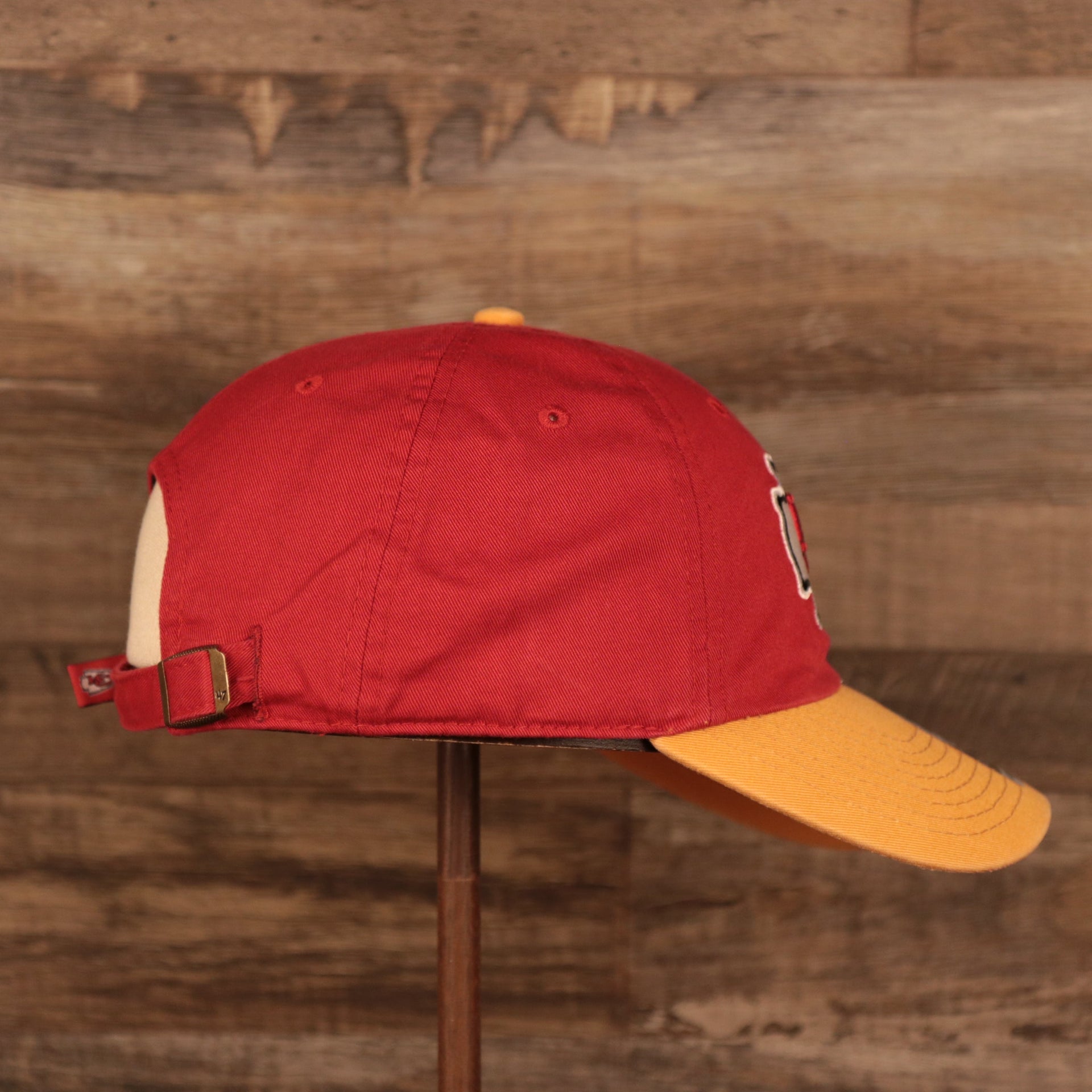 wearers right side of the Kansas City Chiefs Yellow & Red Adjustable Dad Hat