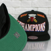 green under visor on the Chicago Bulls Vintage Retro NBA Champions 1997 Mitchell and Ness Snapback Hat | Black