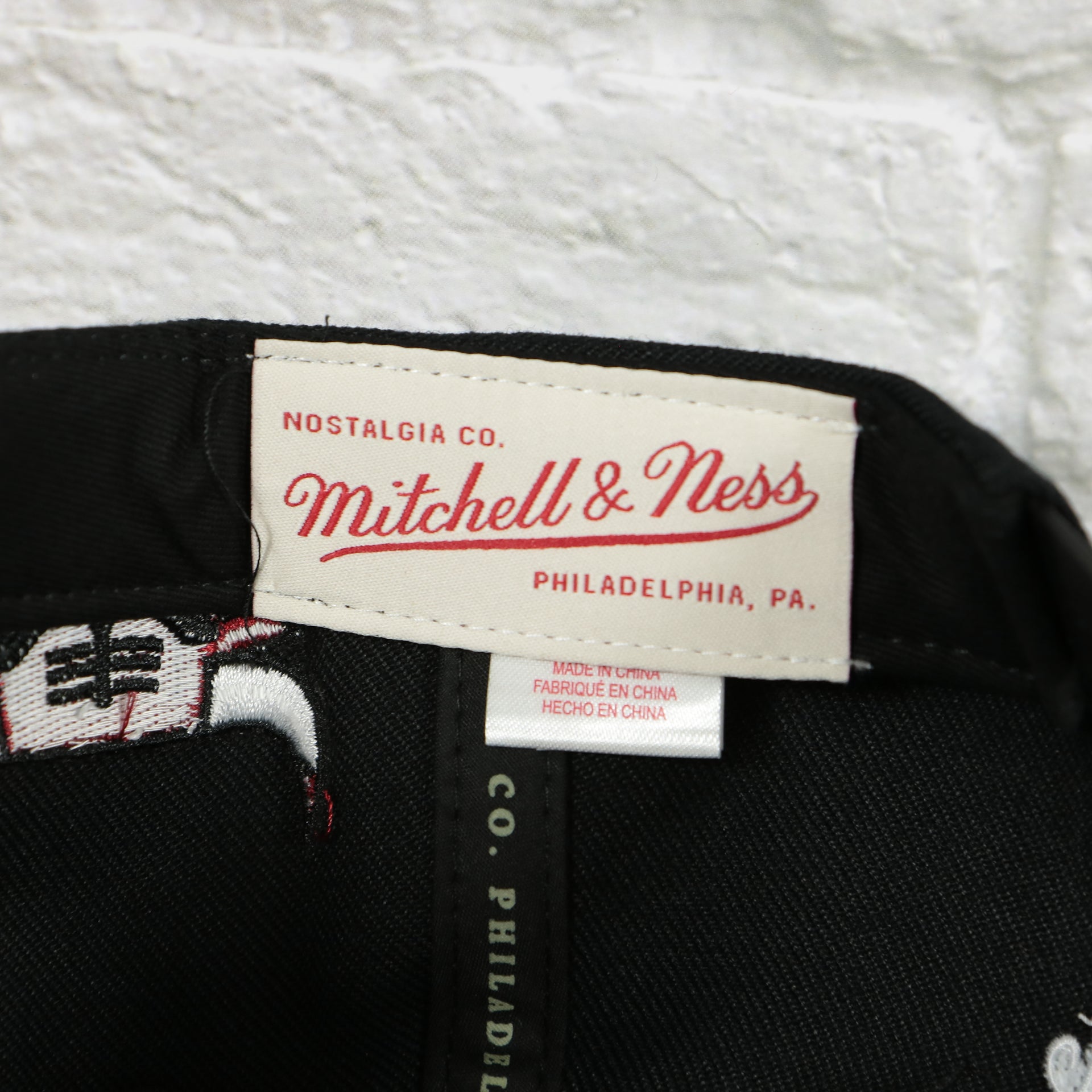 mitchell and ness label on the Chicago Bulls Vintage Retro NBA Team Script 2.0 Mitchell and Ness Snapback Hat | Black