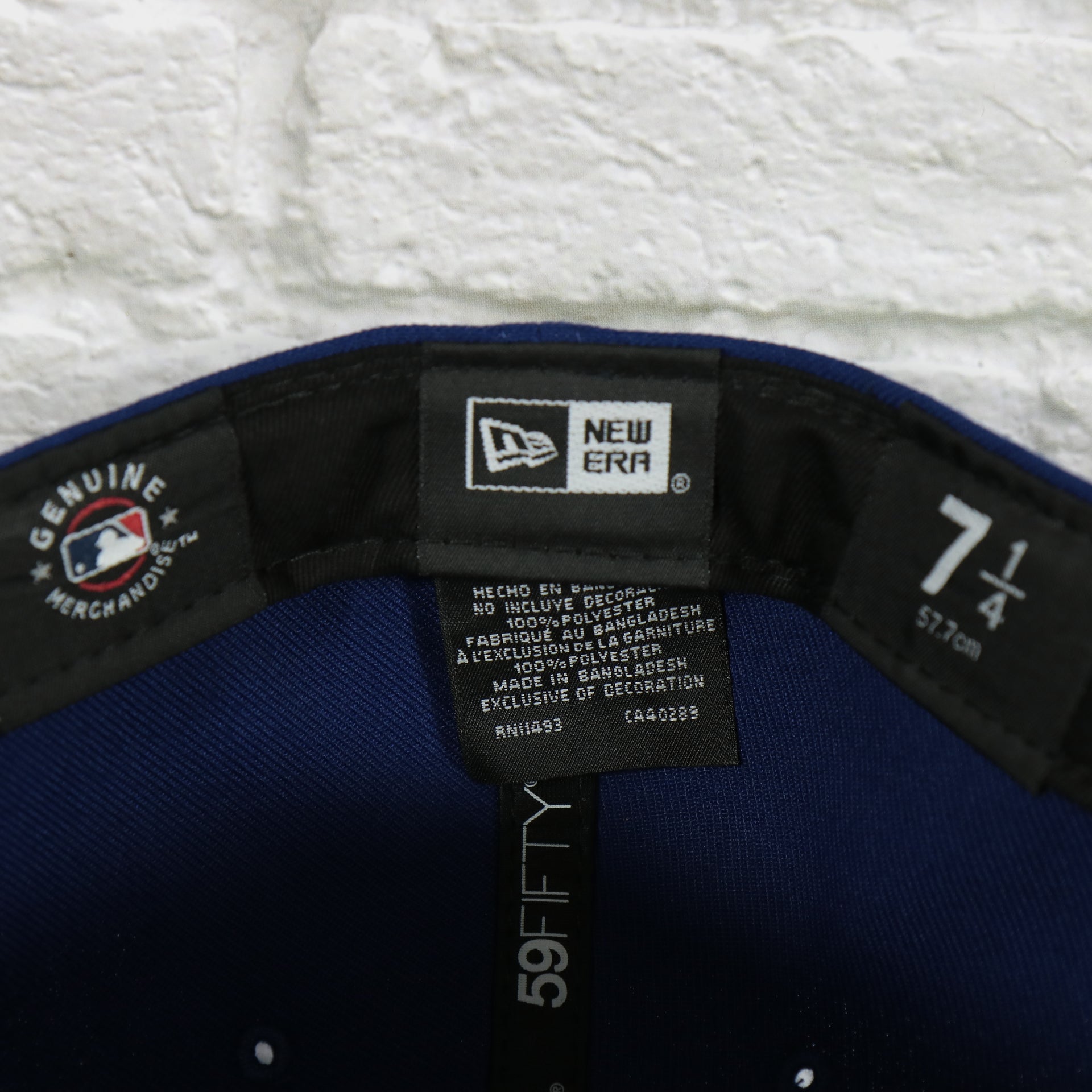new era label on the Los Angeles Dodgers Groovy World Series Champions Patch 59Fifty Fitted Cap | New Era Groovy Side Patch 5950