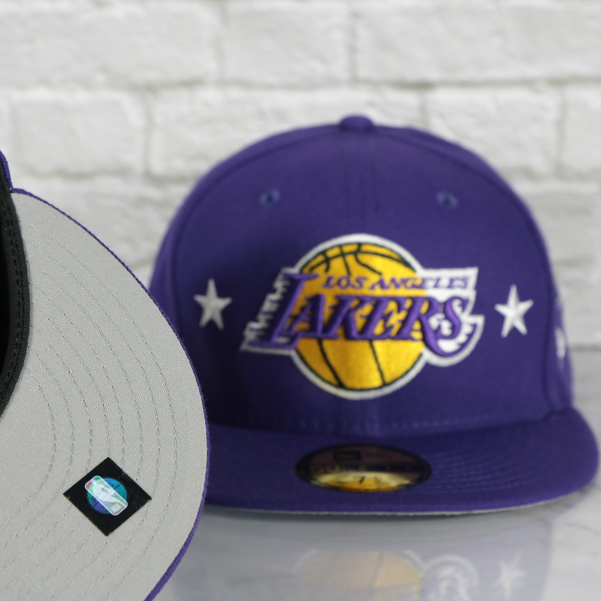 grey under visor on the Los Angeles Lakers City Transit All Over Side Patch Gray Bottom 59Fifty Fitted Cap