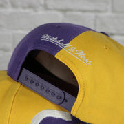 mitchell and ness logo on the Louisiana State University Tigers Retroline Logo Outline Vintage Snapback Hat | Mitchell and Ness Tigers Snap Cap