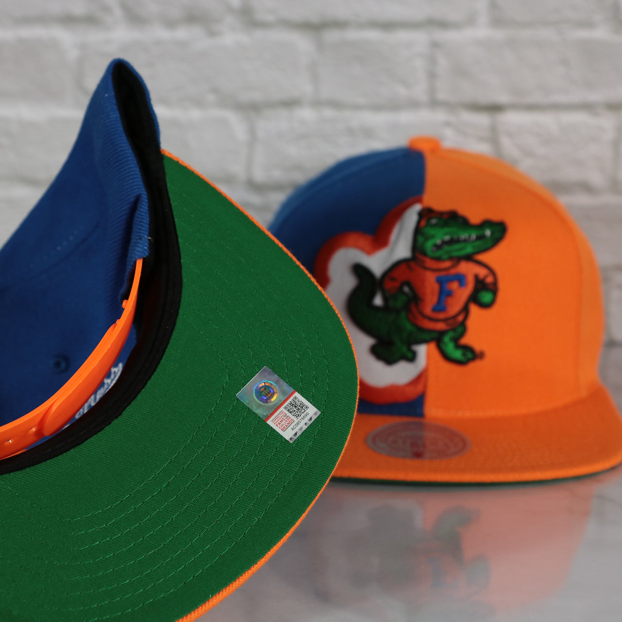 green under visor on the University of Florida Gators Retroline Logo Outline Vintage Snapback Hat | Mitchell and Ness Gators Snap Cap