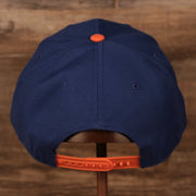 back view of the New York Knicks Royal Blue and Orange Adjustable Grey Bottom Snapback Hat